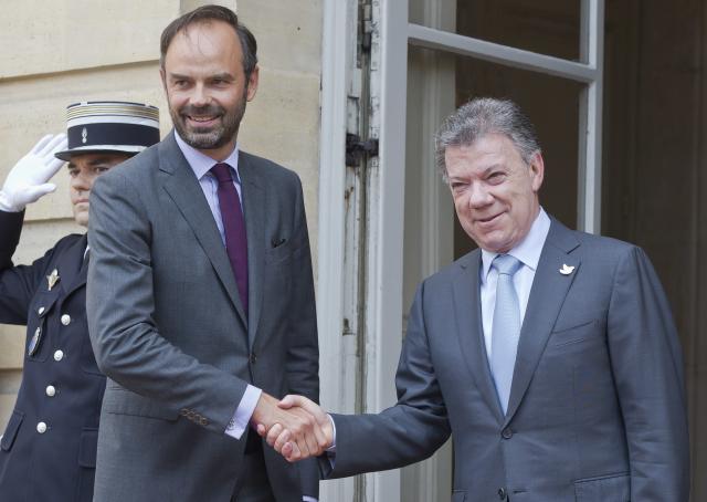 Eduar Filip (levo) sa predsednikom Kolumbije Huanom Manuelom Santosom (Foto: Tanjug / AP Photo/ Michel Euler)