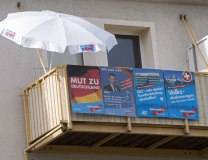 AfD posters are seen on a balcony in Hoyerswerda (Tanjug/AP, file)