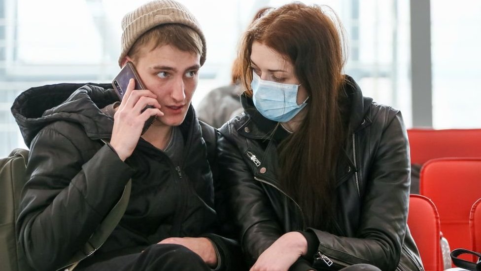 Women around the world are much more likely than men to wear a face mask, evidence shows/Getty Images