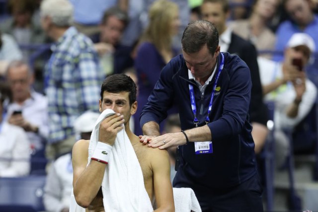 Đoković prošle godine takođe nije završio svoj poslednji meč na US openu, jer je tada predao duel osmine finala Stenu Vavrinki (Matthew Stockman/Getty Images)
