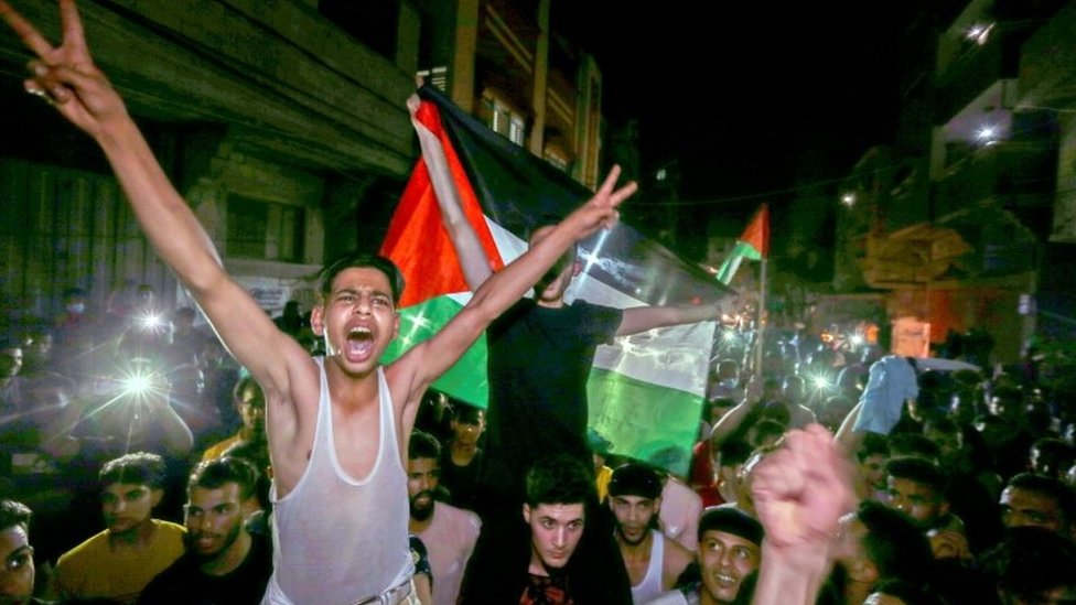 Palestinians poured onto the streets of Gaza soon after the truce began/Reuters
